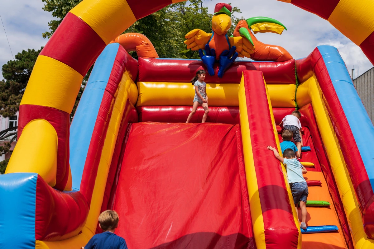 Inflatable slide. Area for entertainment of children at a street festival. 
